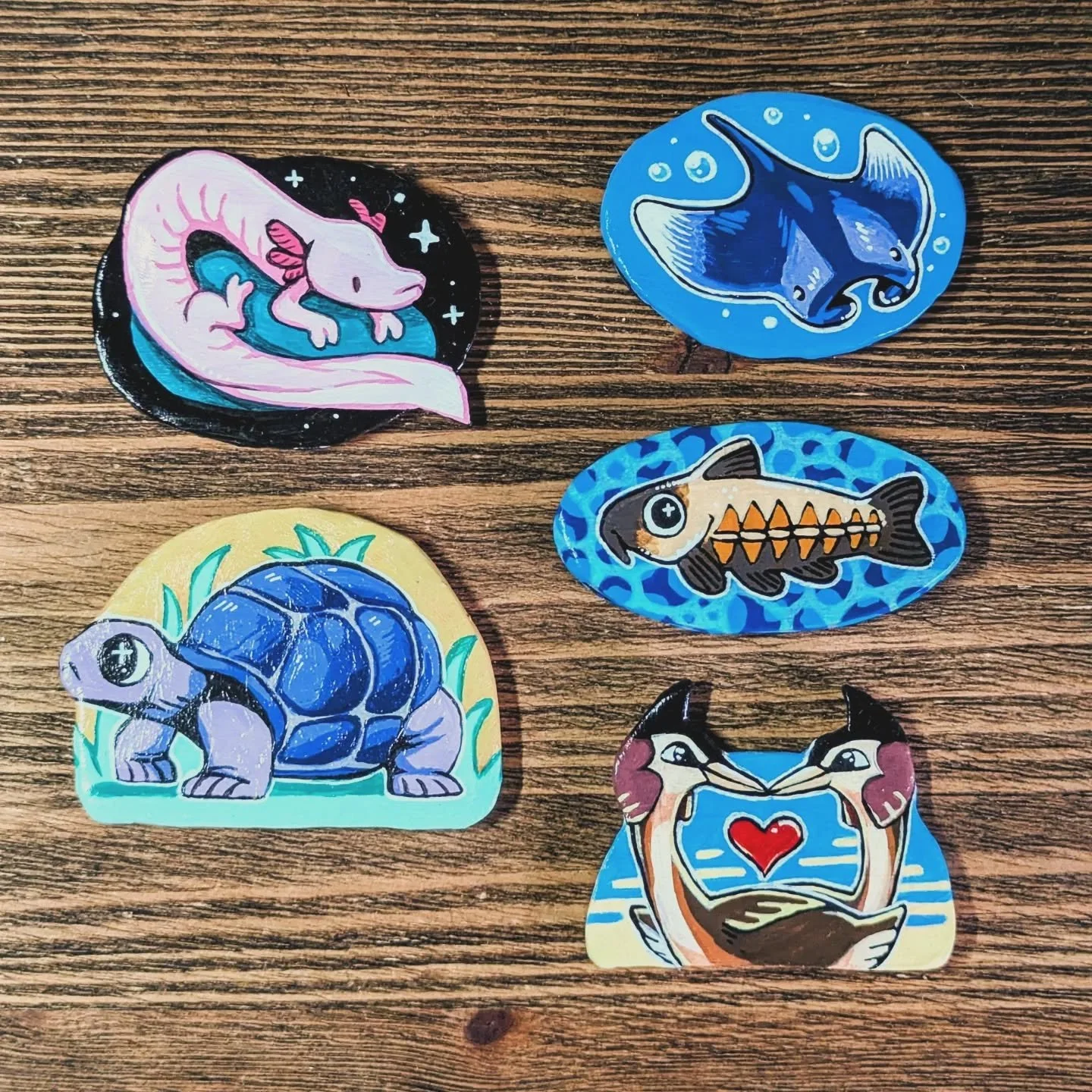 Some handmade clay magnets I made for my husband for Christmas featuring a bunch of his favourite animals. This was the first time I'd used acrylic paints since college, so it was like learning to ride a bike all over again. Except I can't ride bikes