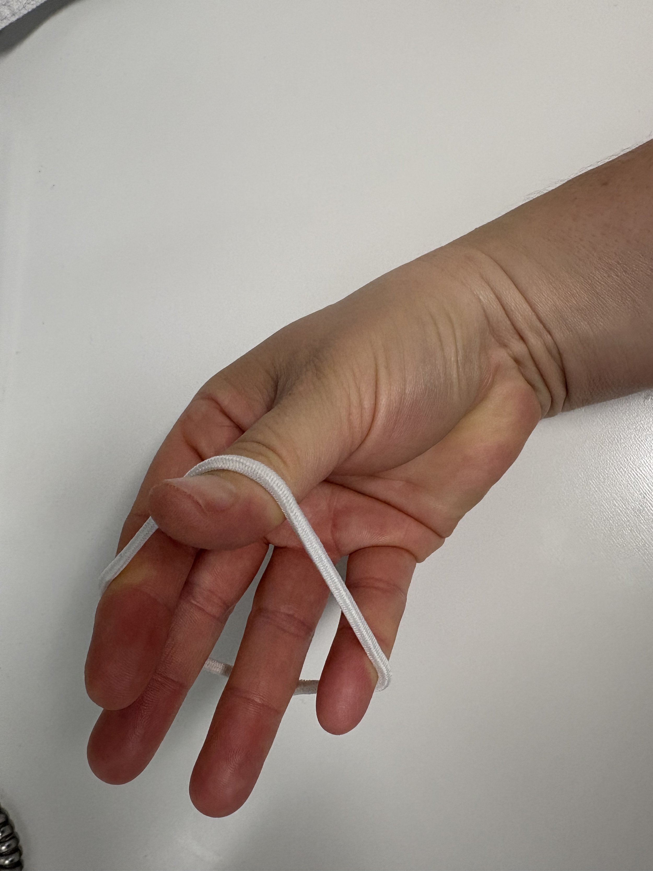 Elastic Band Finger Spread Exercise