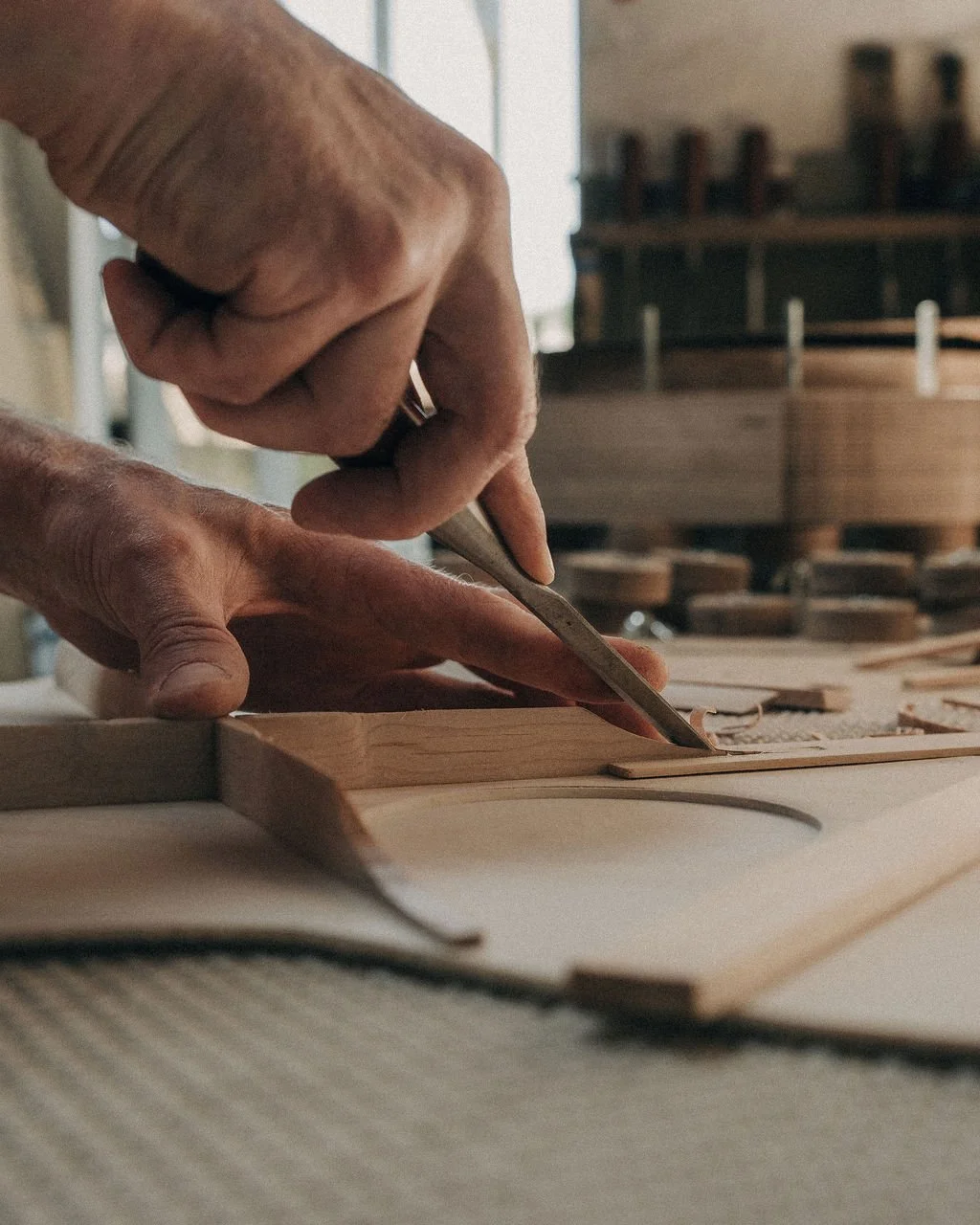 Shaping the X-brace on the new model. Photographed by @alexsedgmond