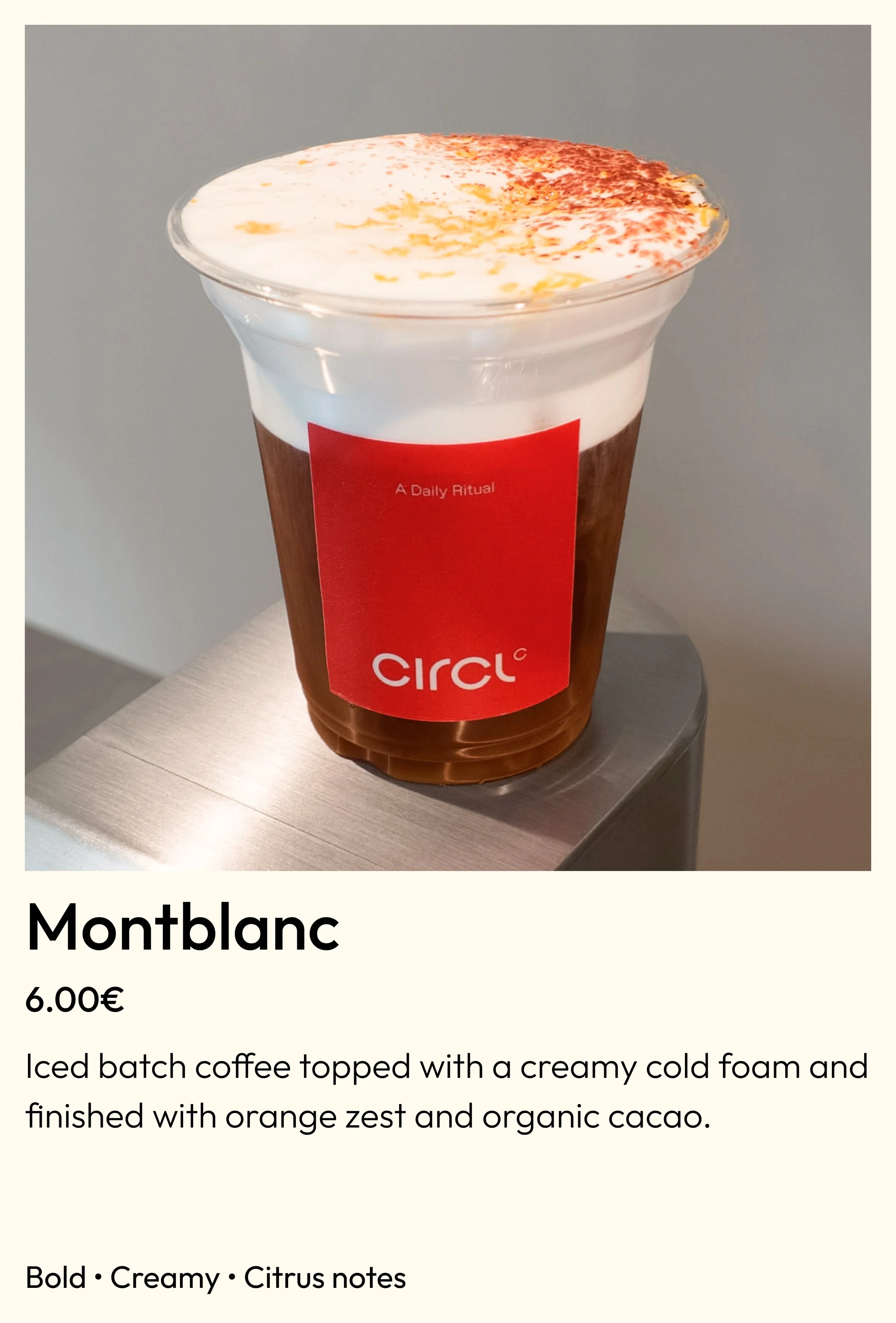 Iced coffee with cold foam and orange zest, a signature drink at Circl in Barcelona