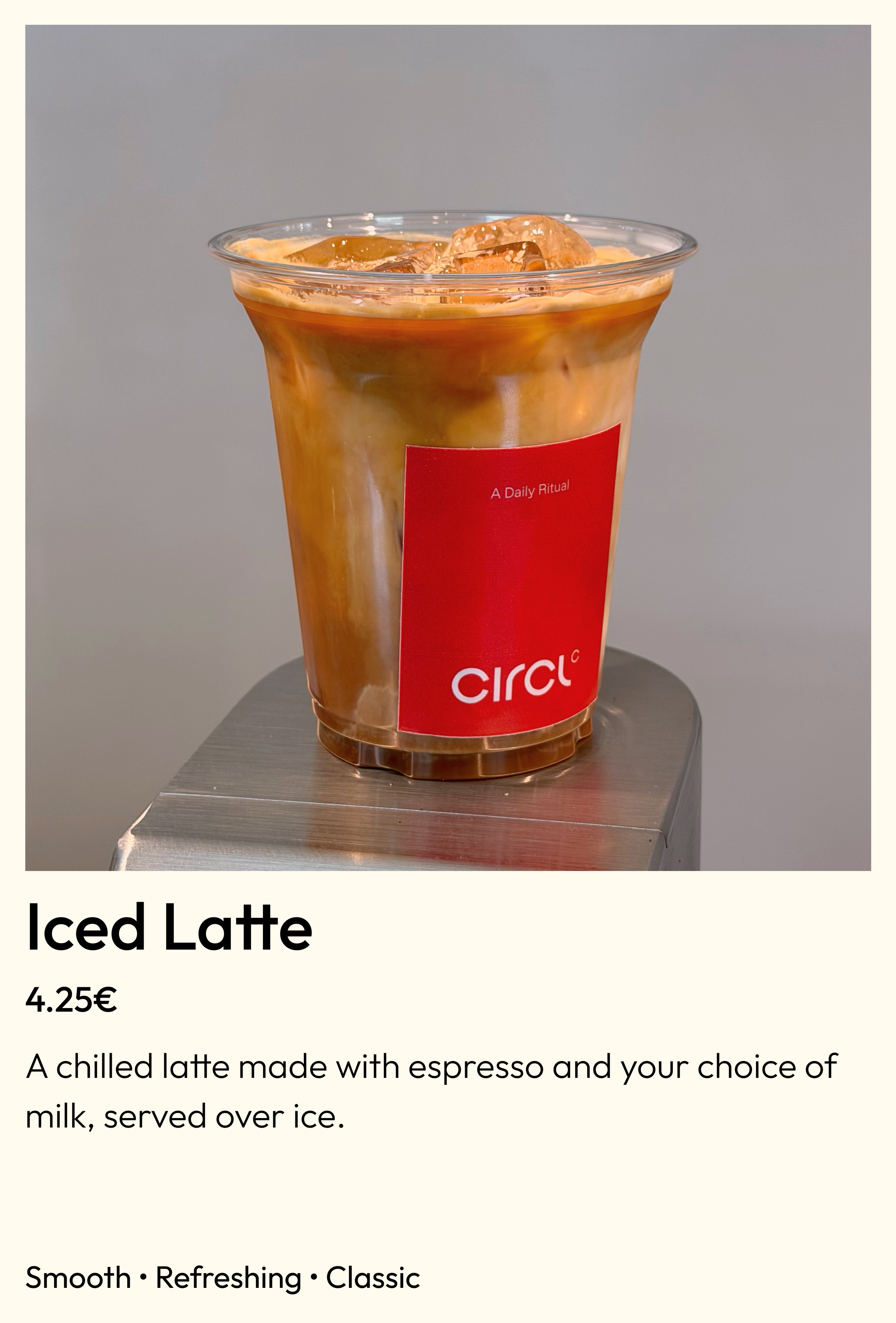 Classic iced coffee latte in a Circl cup, specialty coffee in Eixample, Barcelona