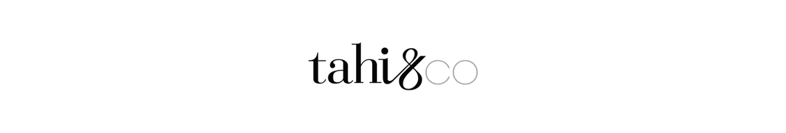 Logo with the text 'tahi & co' in black and gray font on a white background.