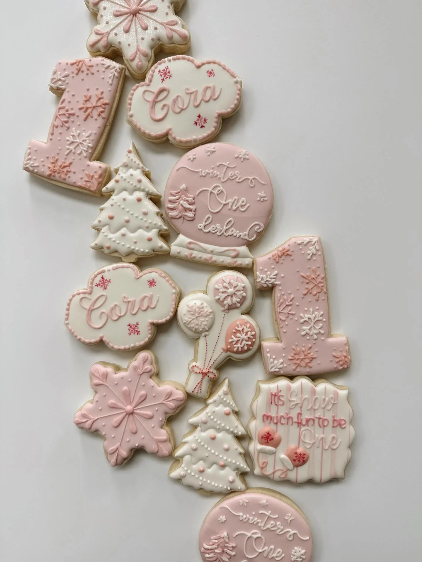 Sweetest Winter ONEderland Birthday Set ❄️🩷 Made to Order &amp; completely personalized to your event. No Artificial Food Colorings✨ request yours at link in bio. 
.
.
.
#customsugarcookies #birthdaycookies #bozeman #bozemanbusiness #dyefree