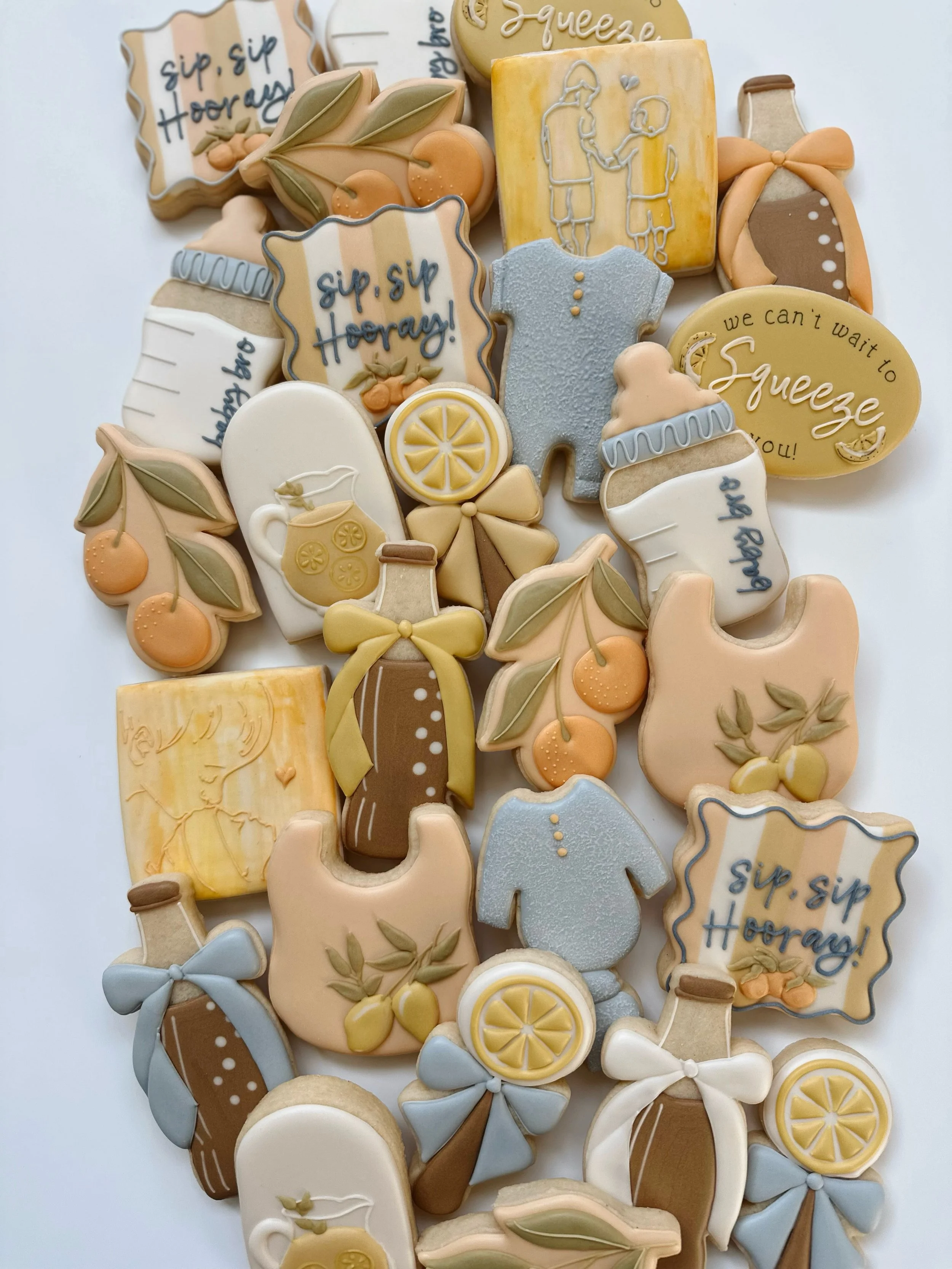 Sip Sip Hooray! Baby on the way! Citrus theme baby shower taking you into the weekend 🍊🍋 I still have some availability for the end of October! Link in bio to request. All dye free, all the time. 
.
.
#customcookiesbozeman #sugarcookies #bozeman #d