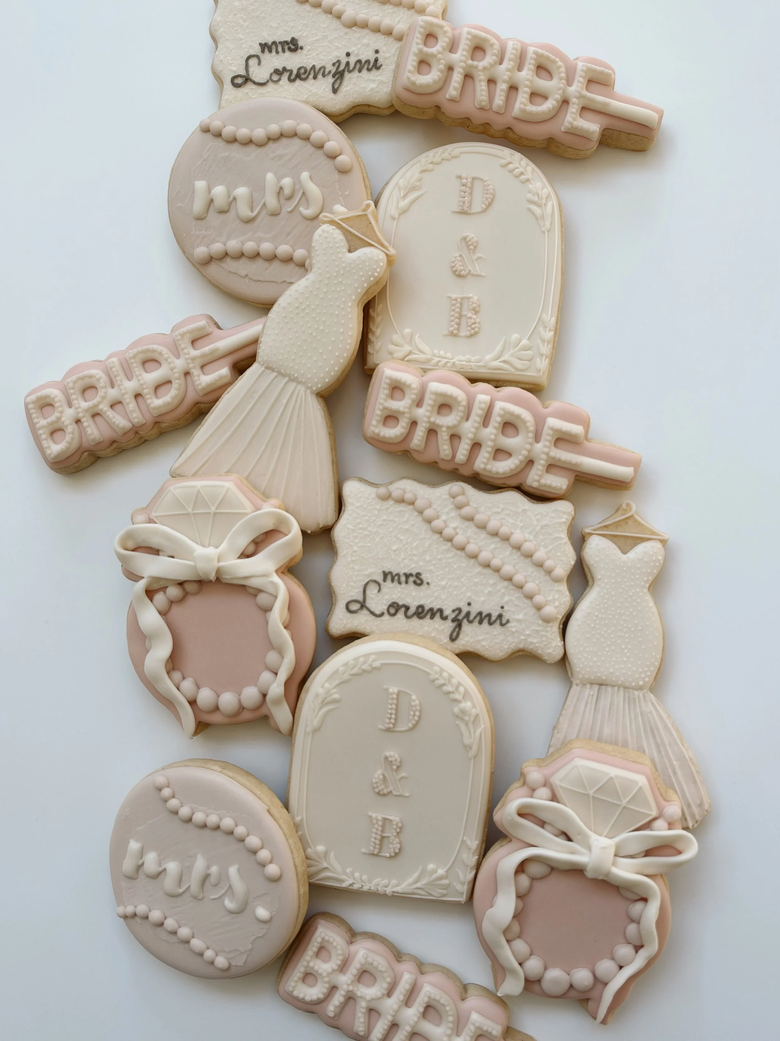 Classic Bridal 🫧 here&rsquo;s to more of this trending in 2027 🤍
.
.
#customcookiesbozeman #sugarcookies #bozeman #bridalcookies #dyefree