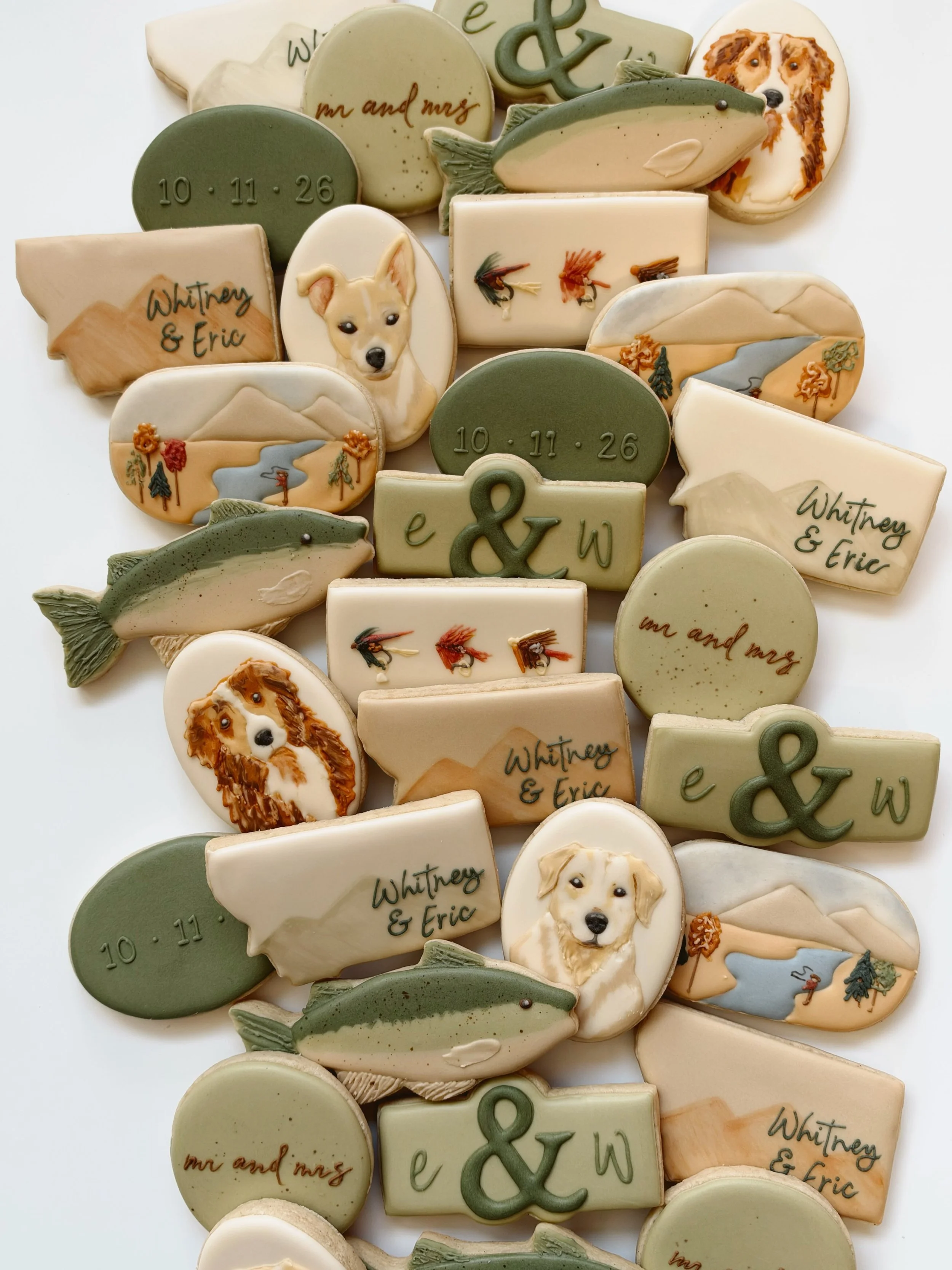 When the color palette you give is just &ldquo;fall colors&rdquo; and your pups happen to match perfectly! Mountain and river inspired wedding cookies for Eric and Whitney who ended up having a winter wonderland wedding when that storm came through. 
