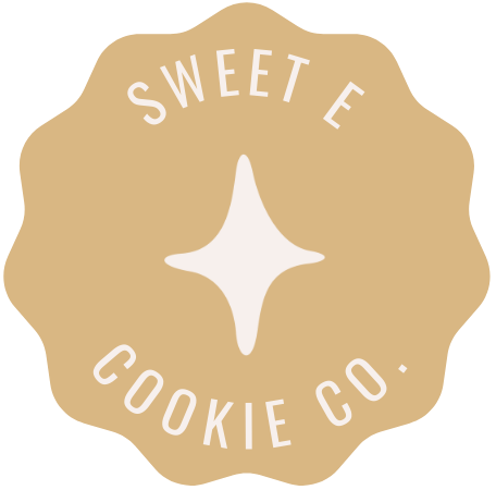 Logo of Sweet E Cookie Co. featuring a beige scalloped circle with a white star in the center, and the text 'Sweet E Cookie Co.' in white curved around the star.