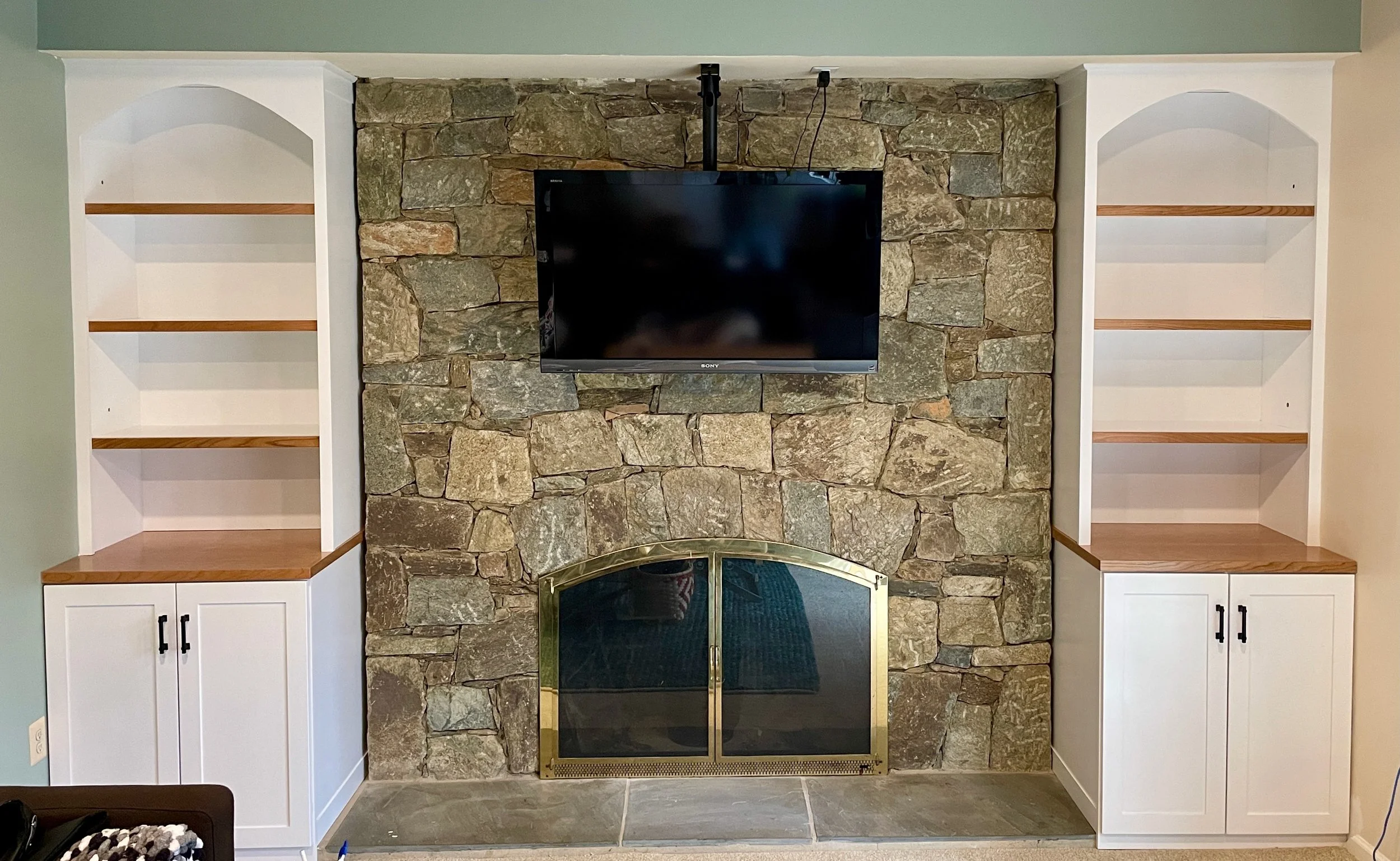 built in fireplace cabinet shelves 1.jpeg