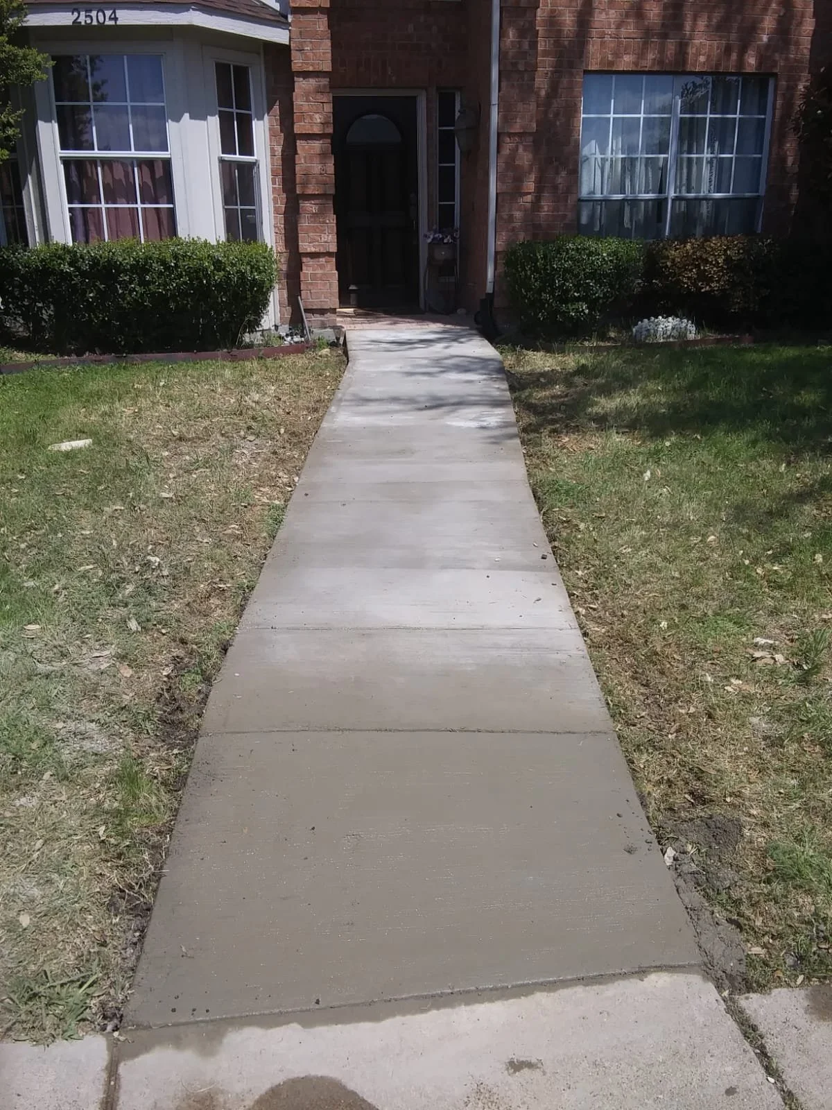 sidewalk nice house.jpg
