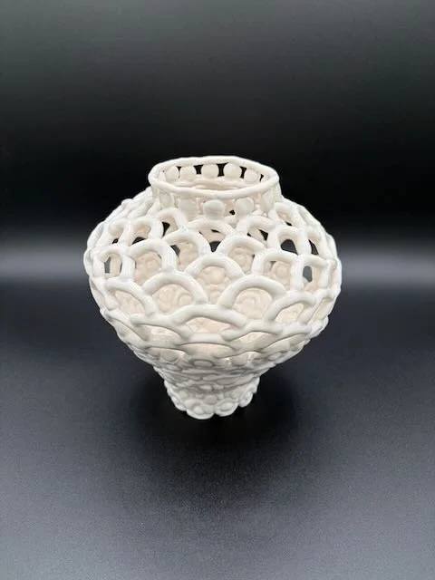 Hand built porcelain moon jar- closed bottom and open weave on top.  