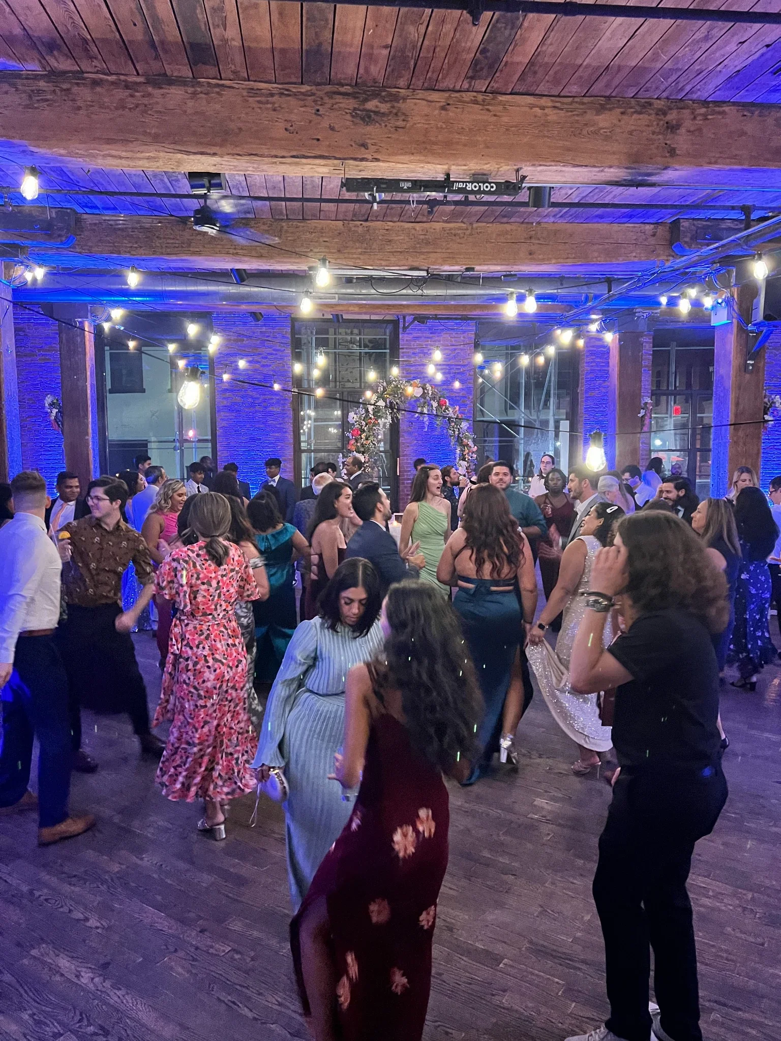 Best Brooklyn wedding DJ Aria Melody lighting at Dumbo Loft wedding reception.