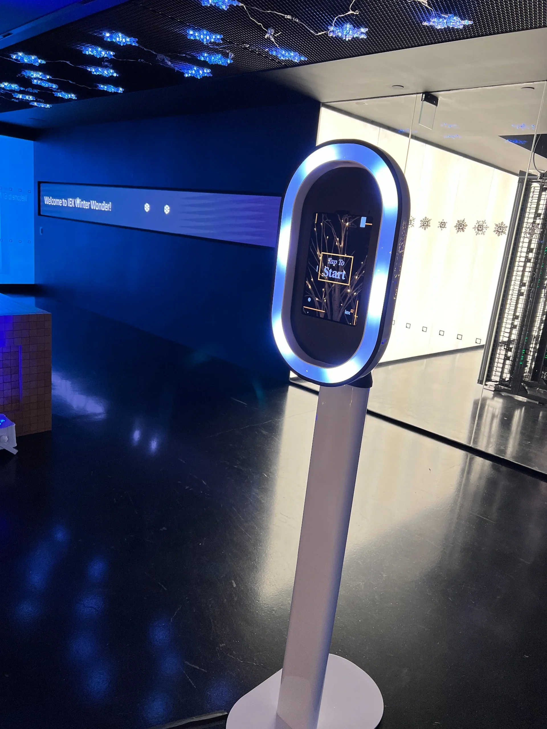 Aria Melody DJ photo booth setup at a NYC corporate event, offering interactive entertainment for company celebrations.