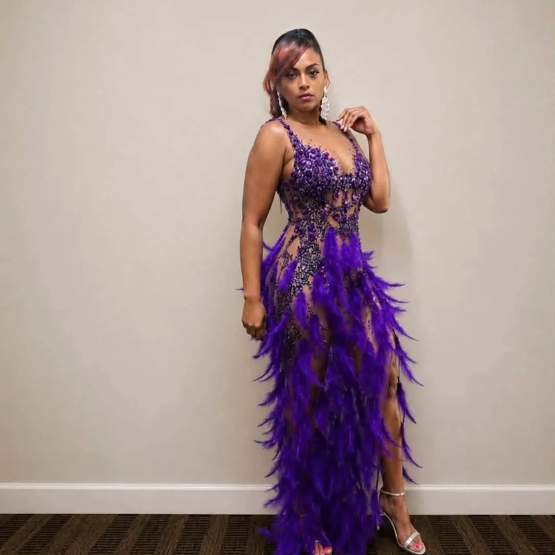 Queen showing out in the Purple Dress
