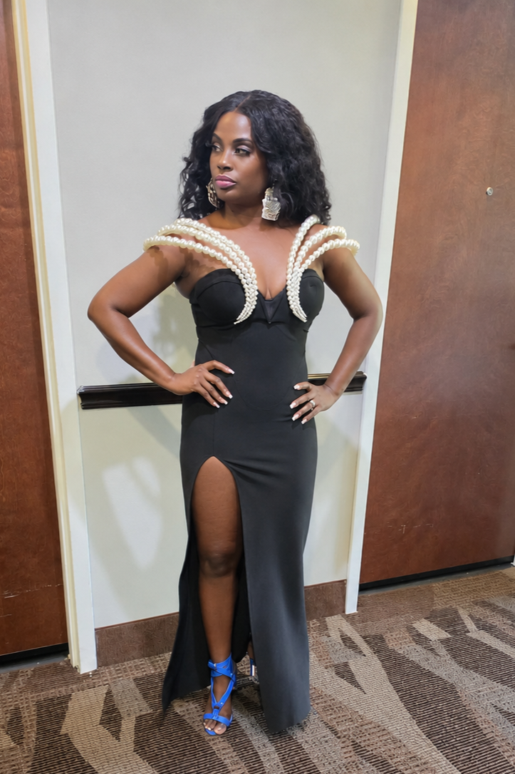 Queen killing it in All black with Pearls Dress