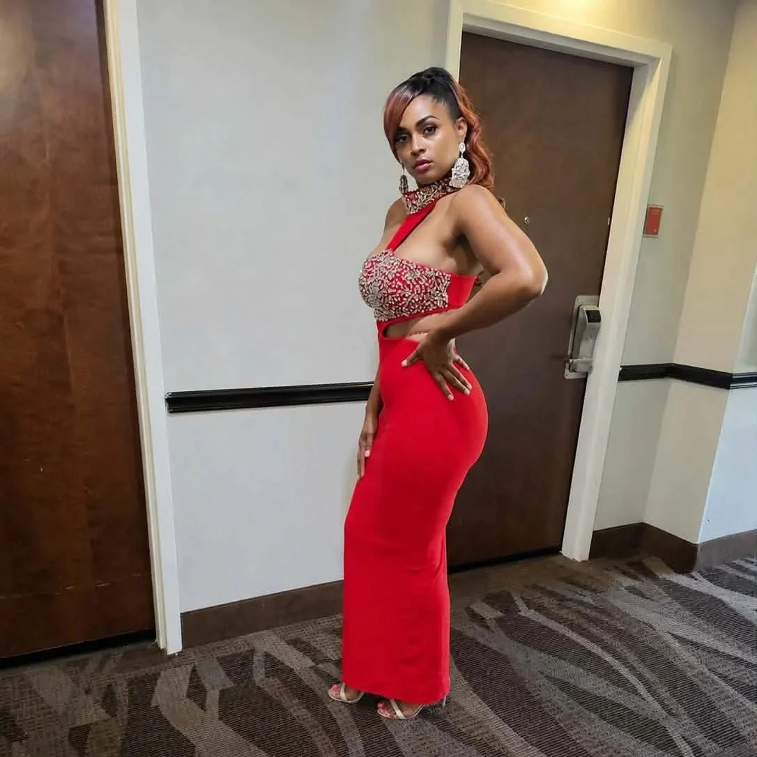 Queen Killing it in the red dress