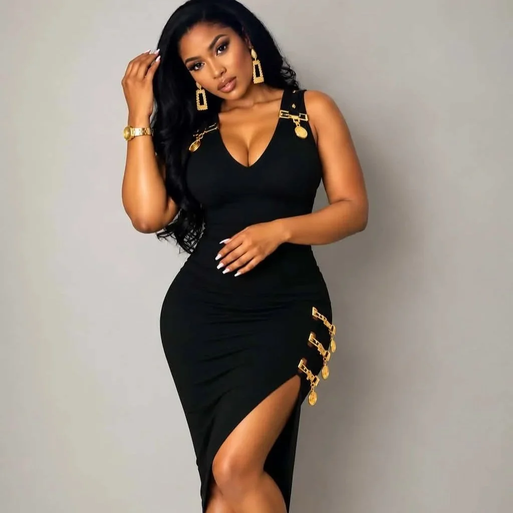 Queen Rocking that Black and Gold Dress