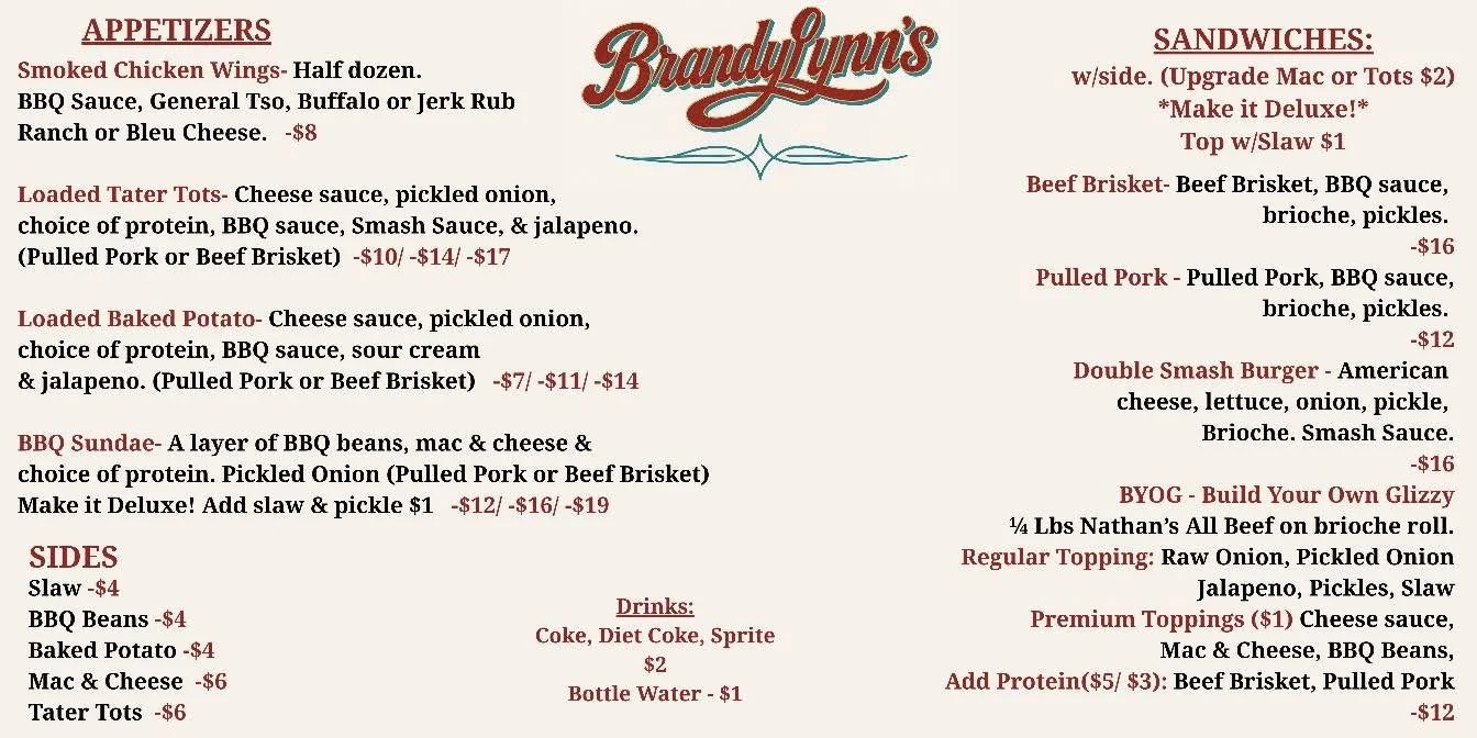 Menu from BrandyLynn's featuring appetizers like smoked chicken wings, loaded tater tots, baked potato, barbecue sundae, and sides such as slaw, baked beans, and mac & cheese. Also offers sandwiches and build-your-own options with various toppings.