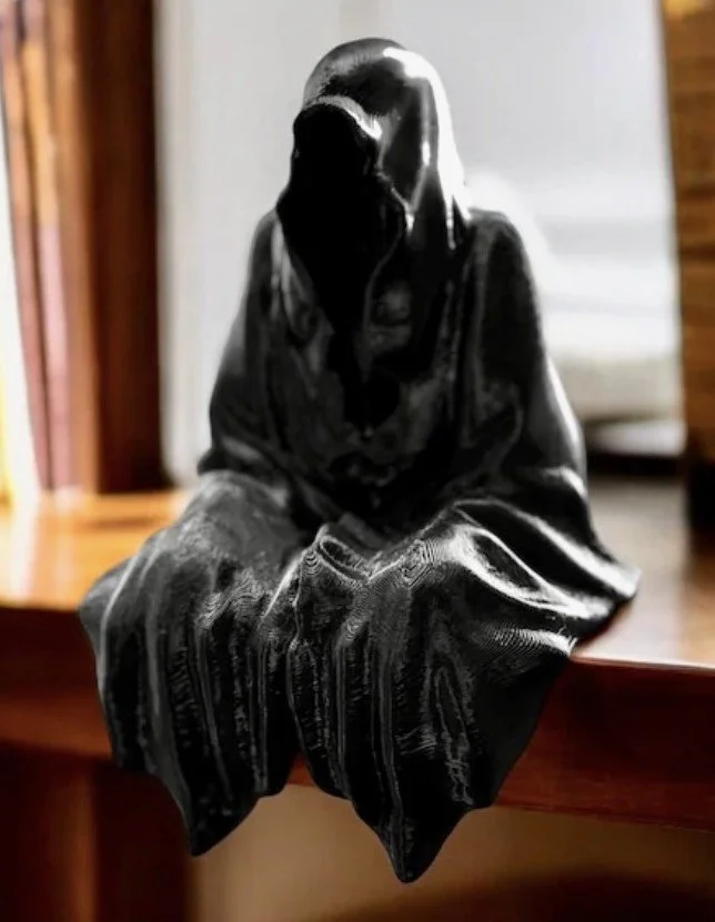 Jack the Reaper on Bookshelf.jpg