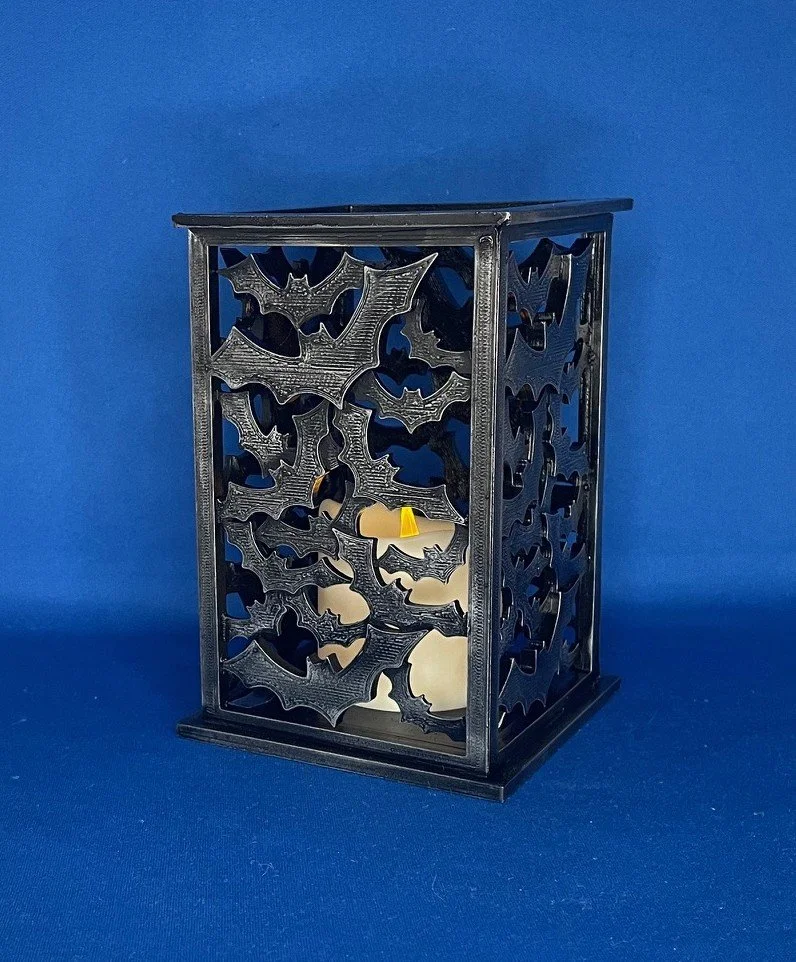 Stacked Bat Candle Display Lit Candle.jpeg