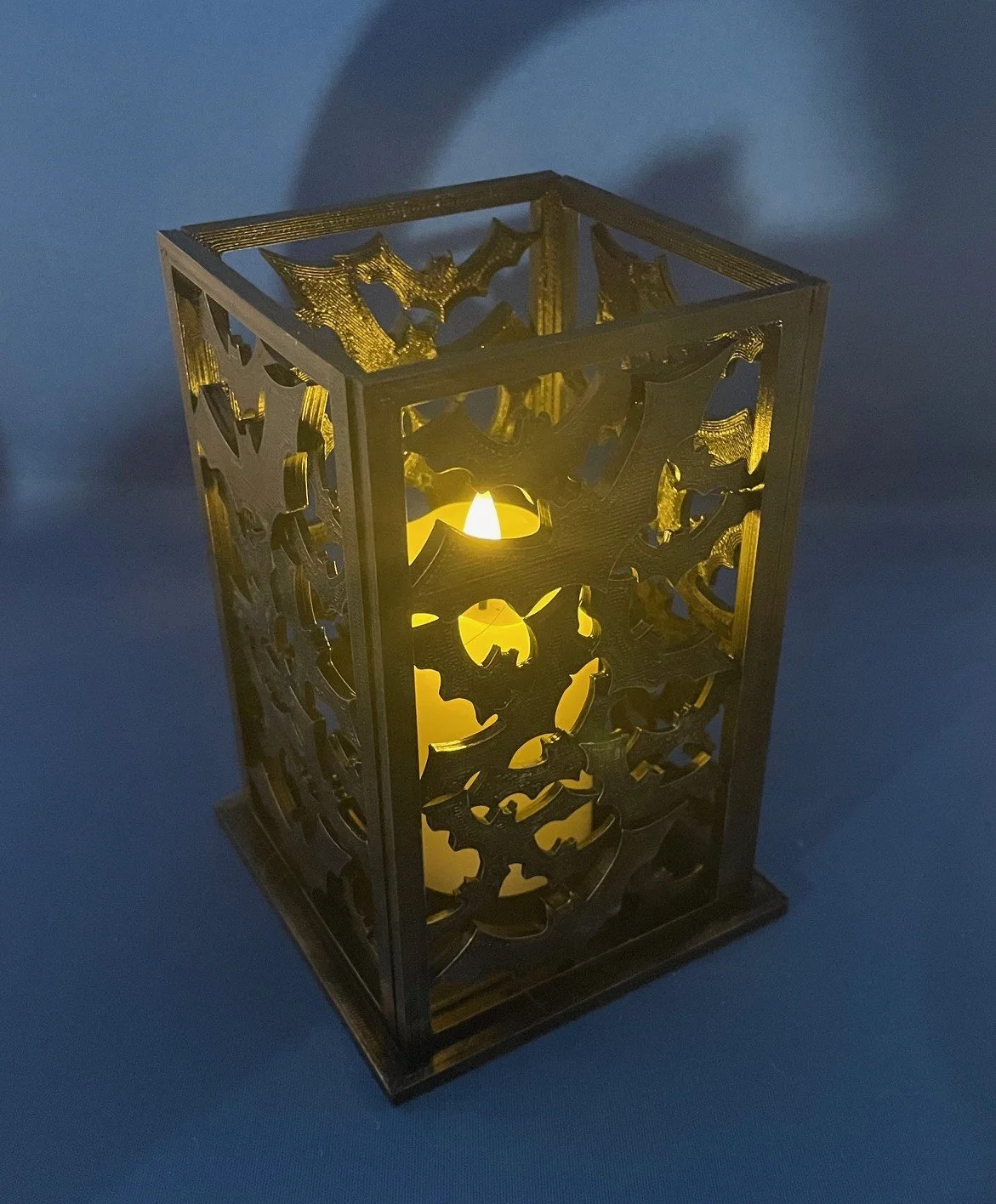Stacked Bat Candle Display Lit Candle.jpeg