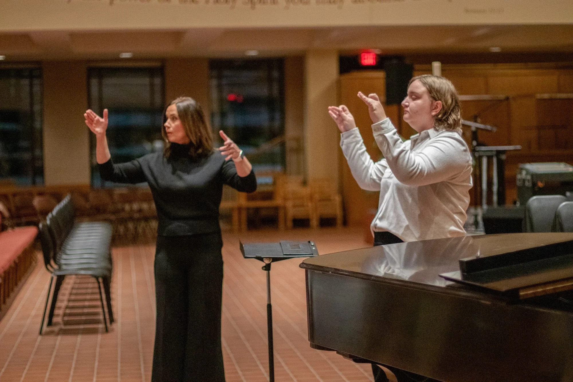 Jennaya Robison instructing a conducting student.