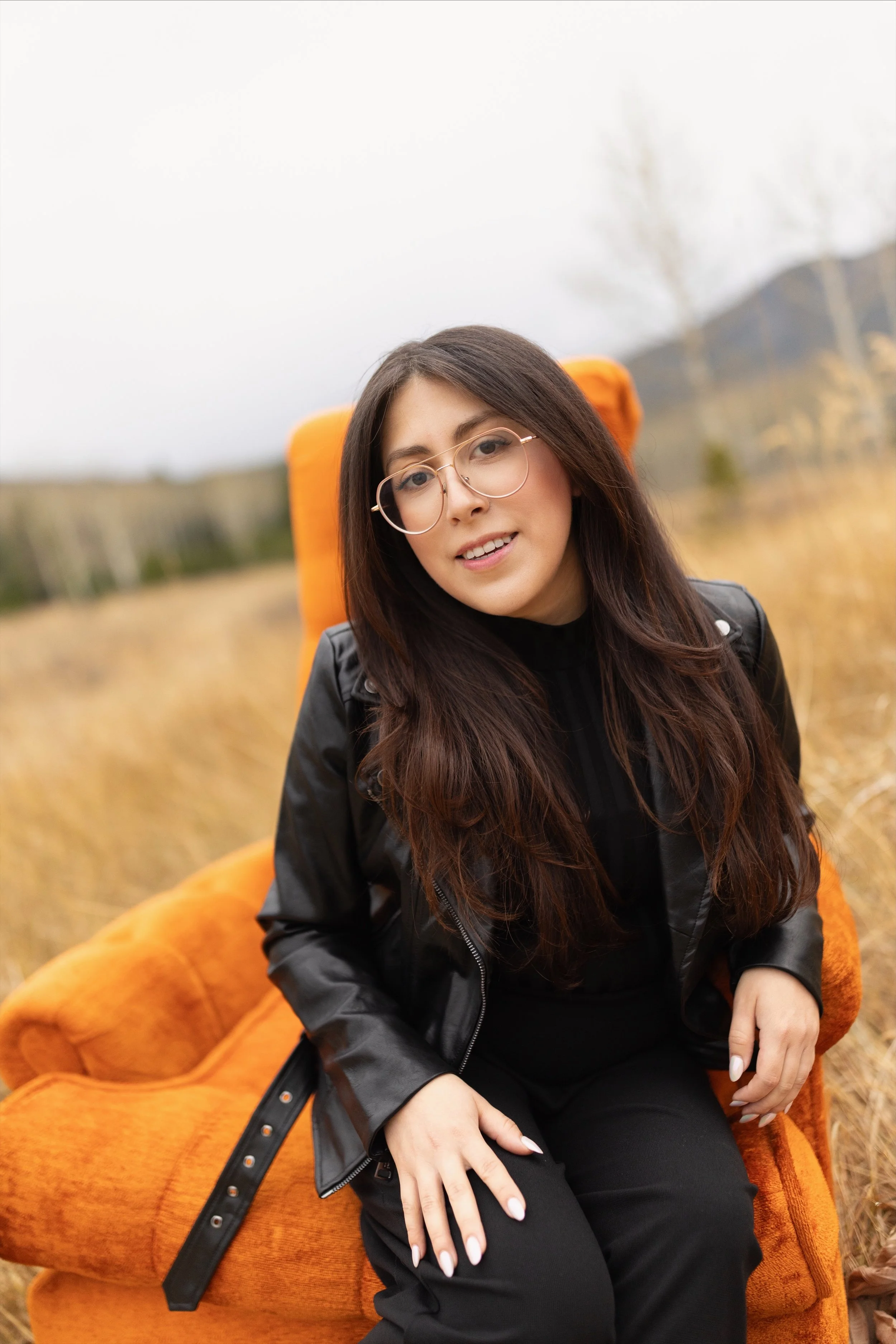 Katheryn the Stylist posing face forward who specializes in low-maintenance haircolor