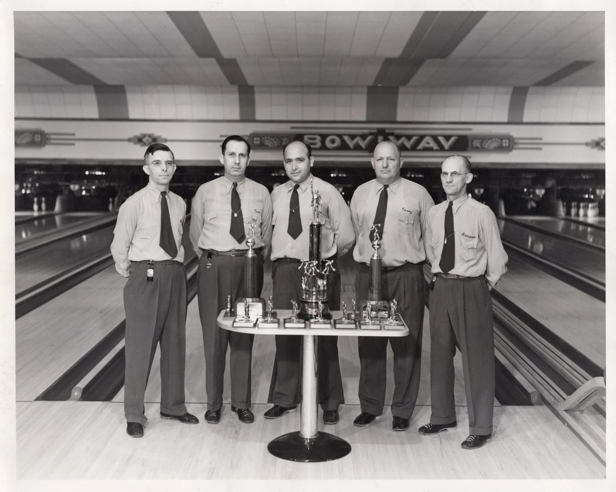 Founder, C.L. Boulos (center), with the original members. Mid 1940s. 