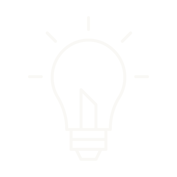 Outline of a light bulb with rays indicating illumination on a black background.