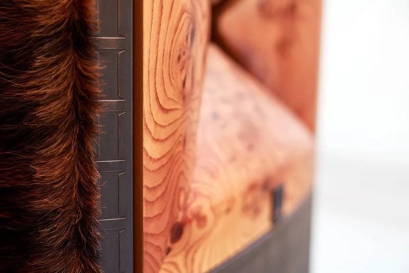 The solid brass vertical trims, embossed with the Ideaworks logo