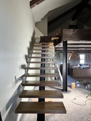 Floating staircase iron beams & white oak treads Goodlife Construction