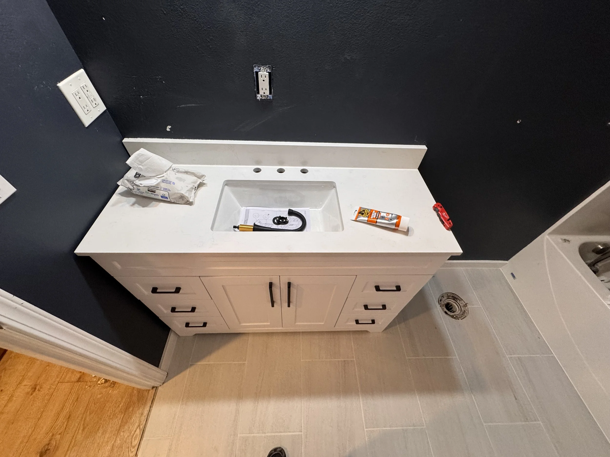 Bathroom remodel tile floor by Lehman Construction in Roseburg, Oregon.