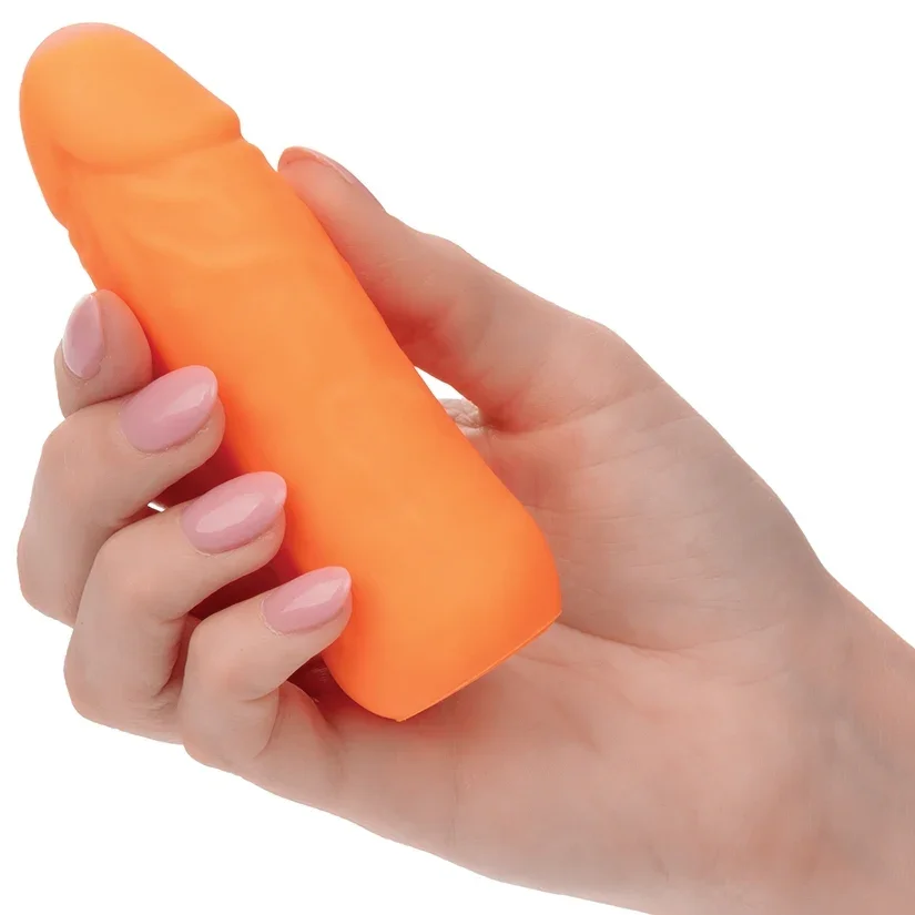 mini vibrating stud item in hand orange.webp