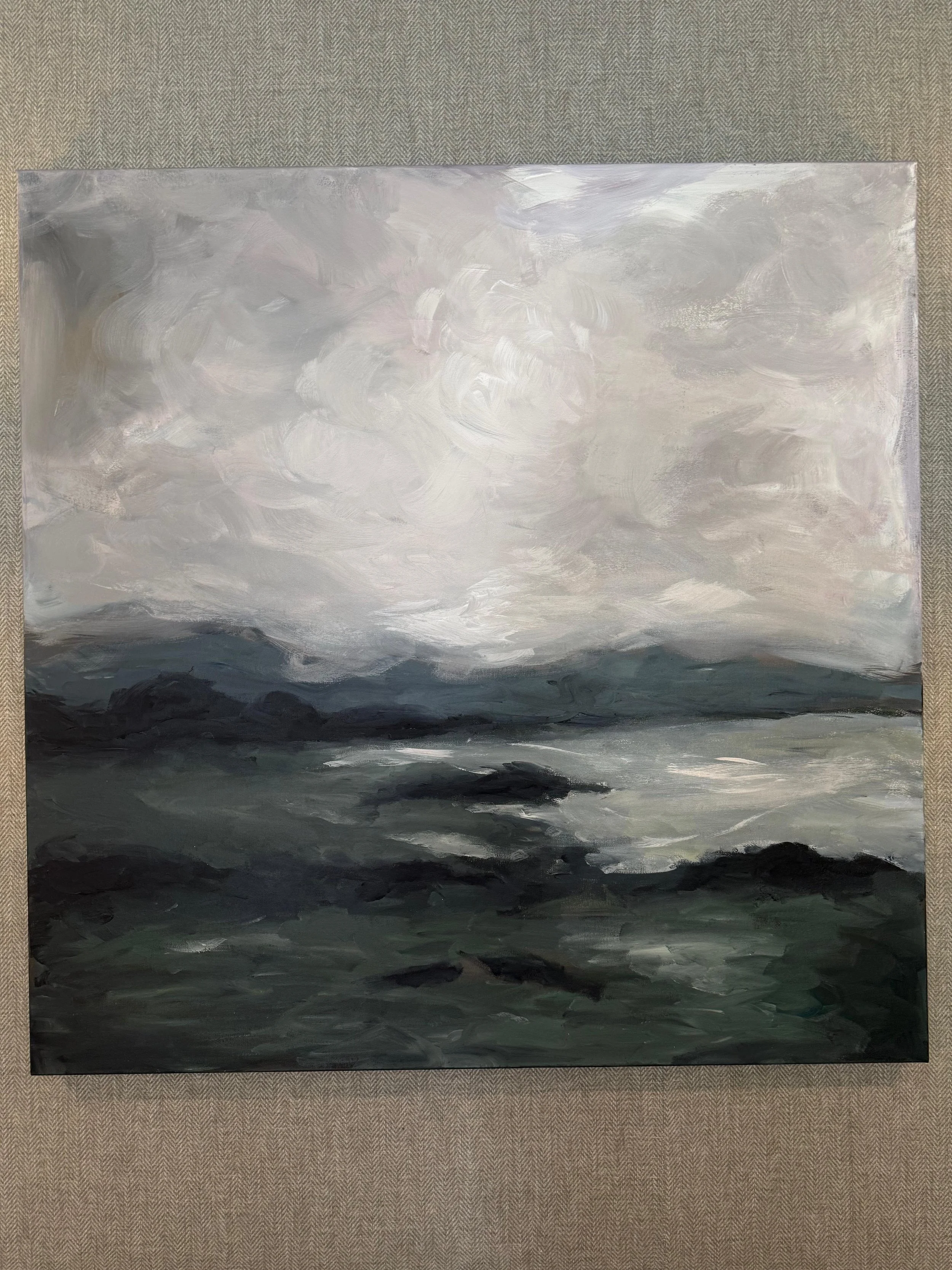 Abstract painting with monochromatic shades of gray and black, featuring swirling and blending brushstrokes.