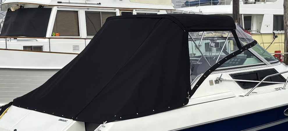 Custom marine canvas cockpit enclosure with clear vinyl windows