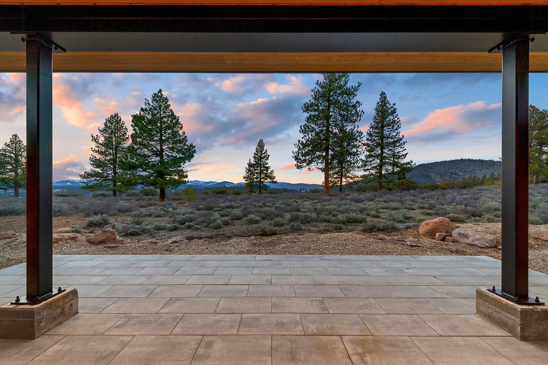 tudor-lane-mountain-view-from-back-covered-patio.a08.webp