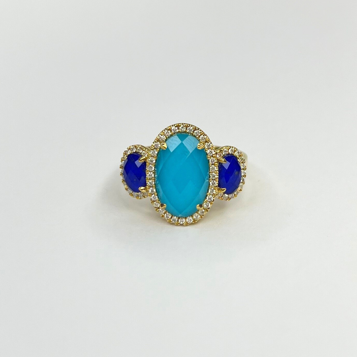 Elegant 18K yellow gold ring featuring clear quartz over lapis and turquoise, accented with sparkling diamonds. Custom-sized to fit.