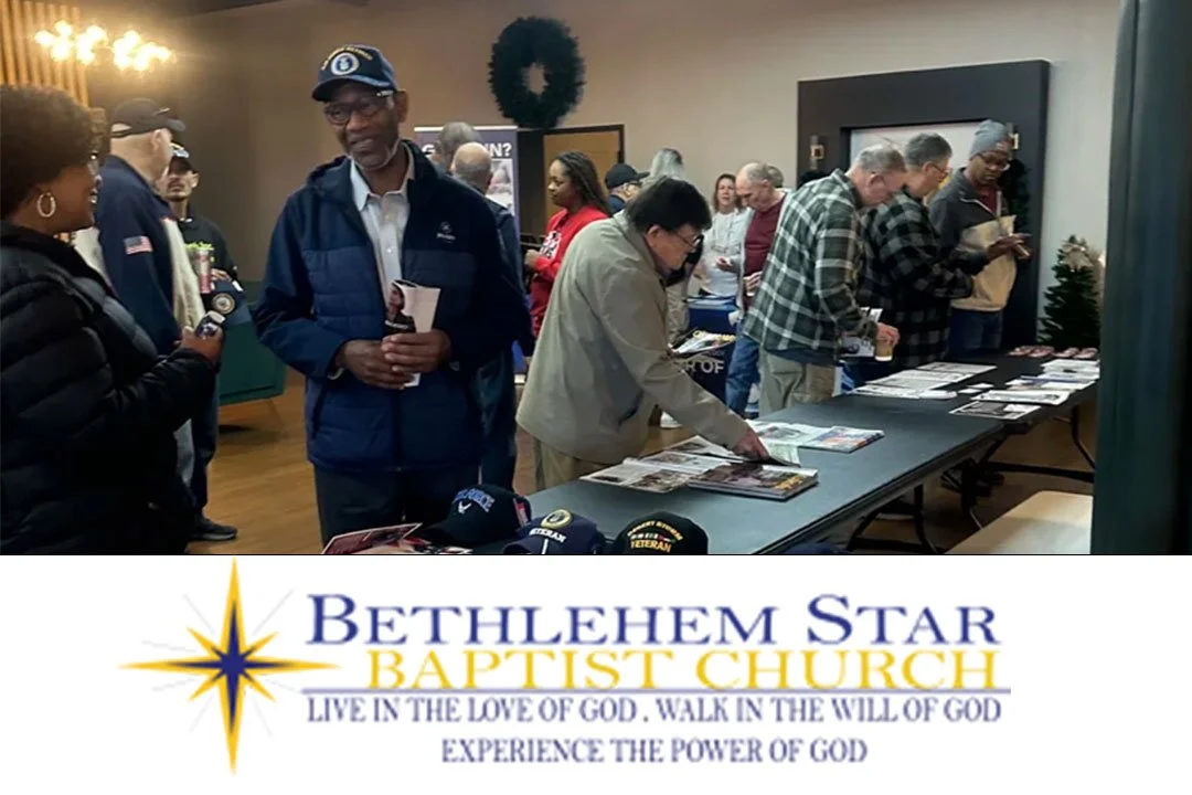 Silhouette of a soldier saluting against an American flag overlay and a sunset sky.