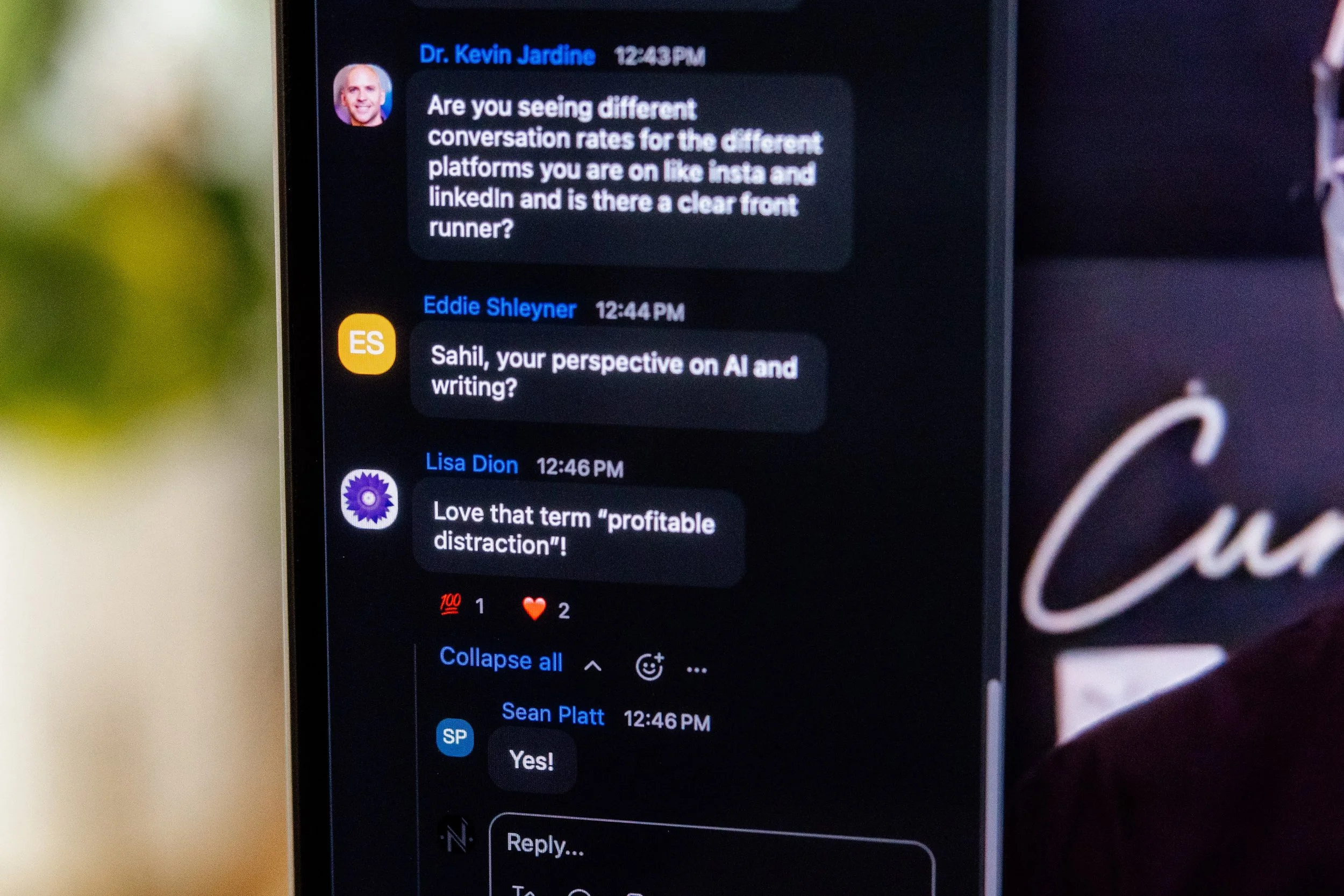 A smartphone screen displaying a chat conversation with messages from three individuals, including profile pictures and timestamps, discussing AI and social media engagement.