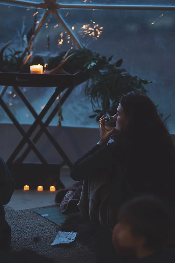 woman drinking cacao on winter solstice at morningside farm