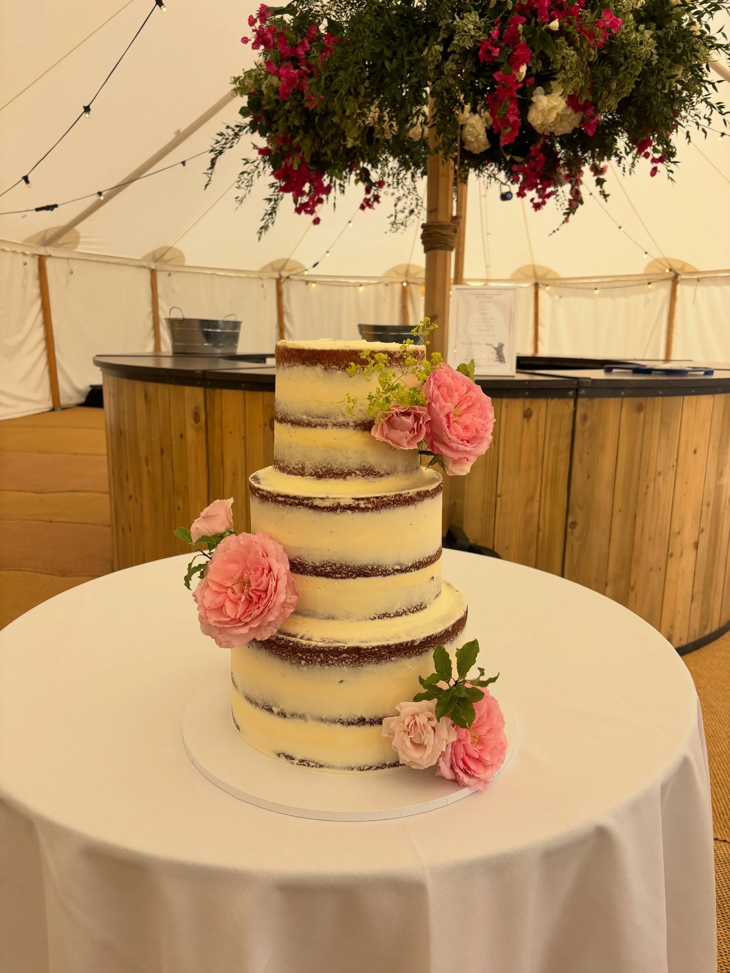 For Lucy &amp; Bryn 🤍

Three tiers of lemon &amp; elderflower sponge, filled with lemon curd and elderflower buttercream ✨🌸 🍋 

#weddingcake #weddingcakeideas #weddingcakeinspo #lemonandelderflowercake #bakesbyflo