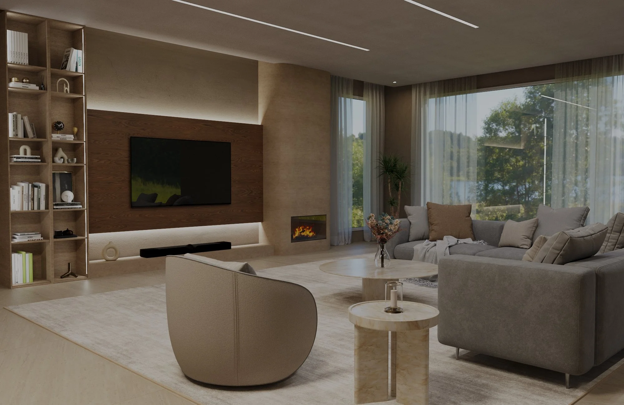 Modern living room with a large gray sectional sofa, a round marble coffee table, a beige armchair, a wall-mounted TV on a wooden accent wall, a flat fireplace, bookshelves with decorations, large windows with curtains showing trees outside, and a po