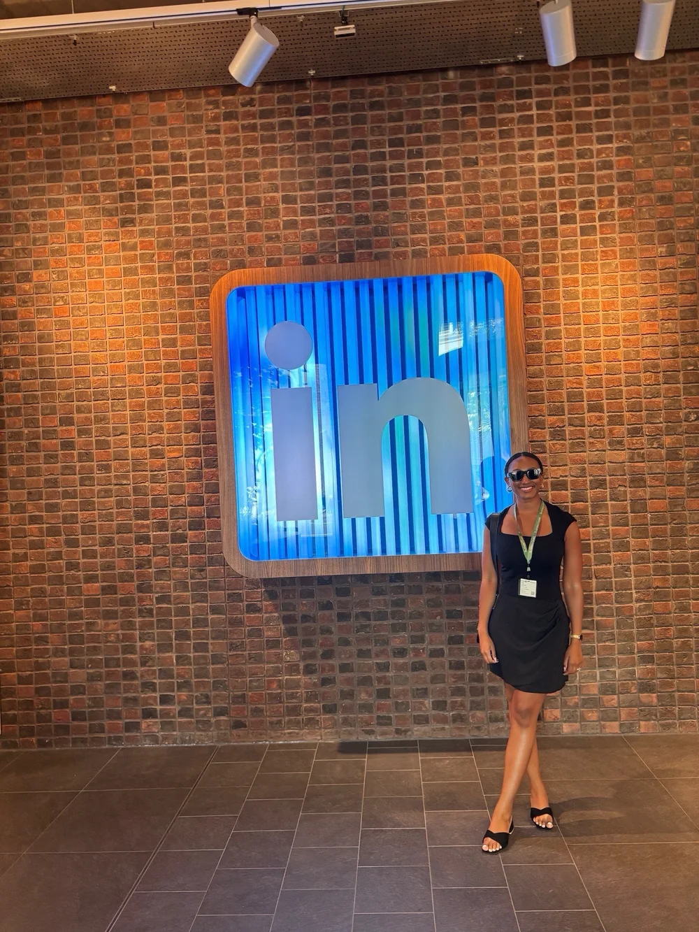 Melissa Labiran beside a LinkedIn sign