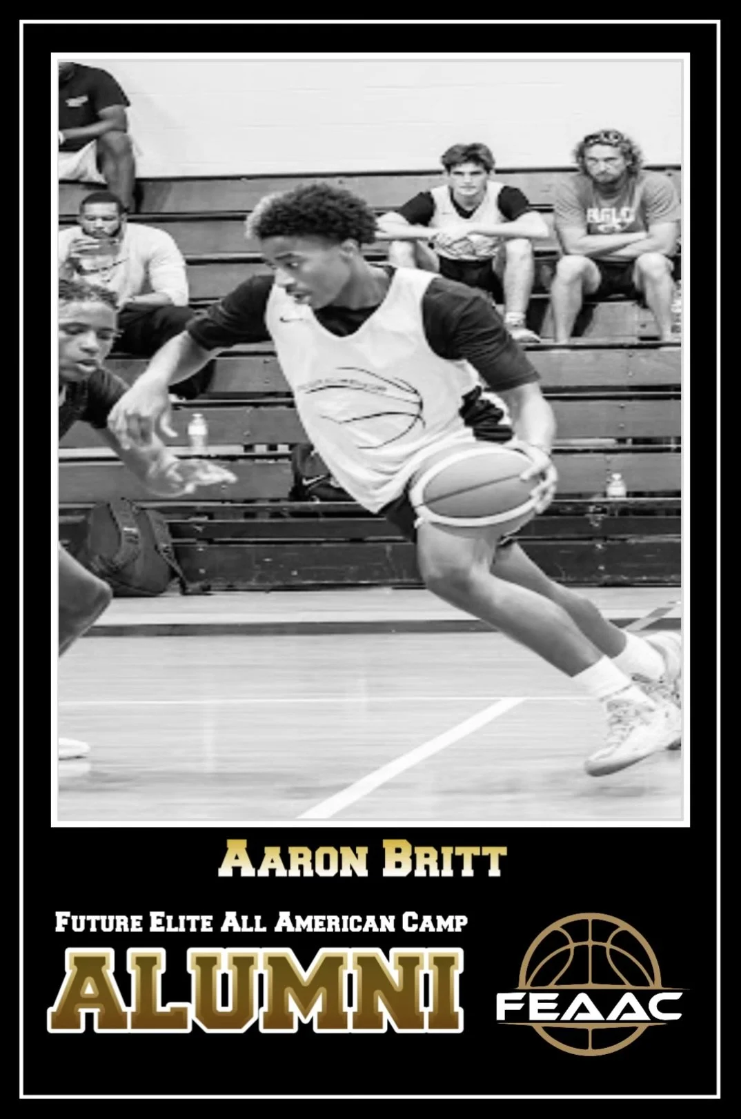 A young man running on a basketball court, wearing sports attire including a black and white jersey and shorts, with a focused expression.
