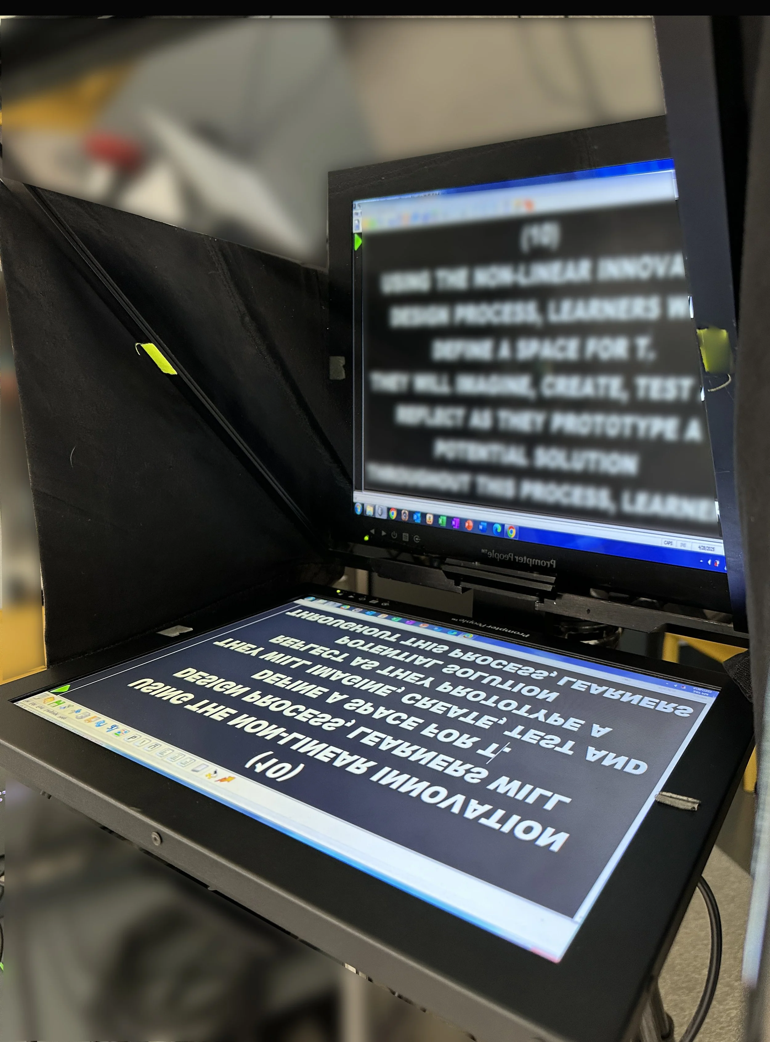 In front of camera teleprompter.