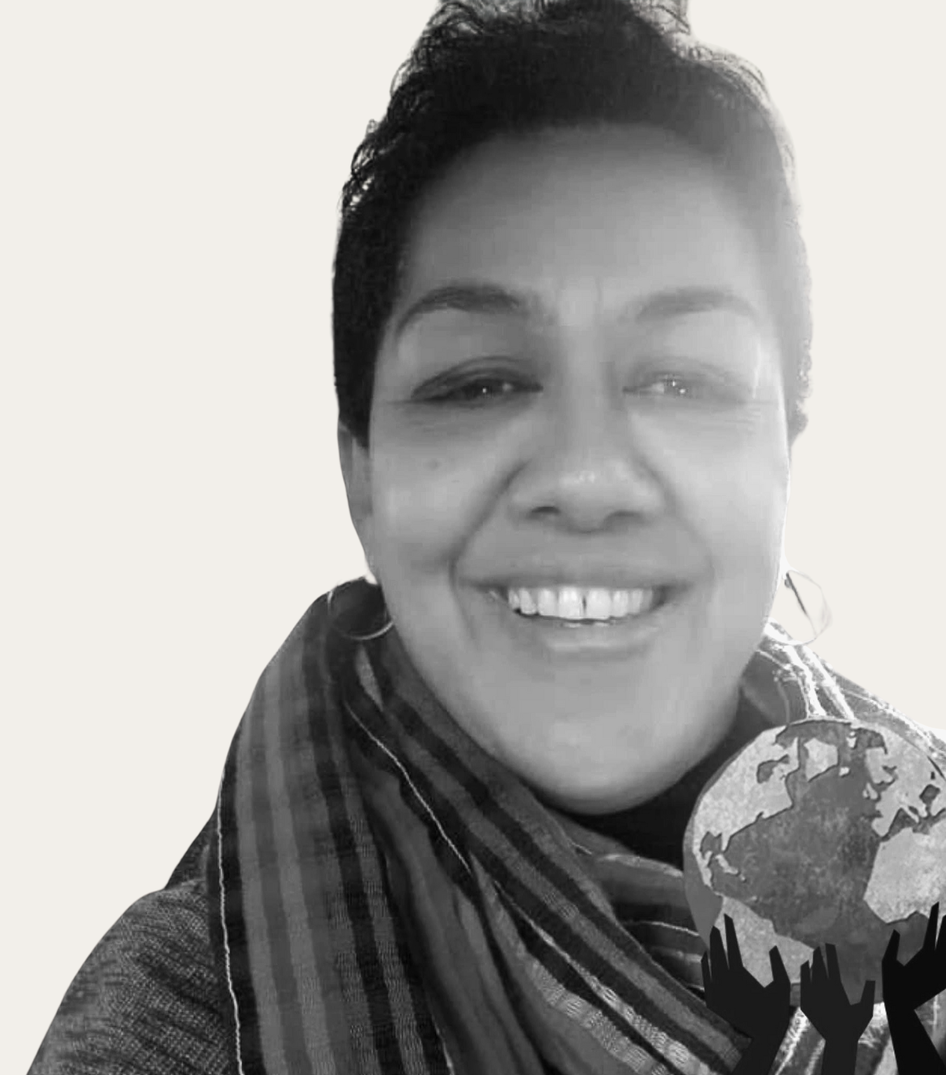 Black-and-white portrait of a woman smiling, wearing a scarf and a jacket, with a graphic of hands holding the Earth overlayed in the lower right corner.