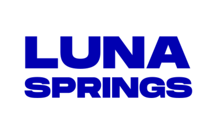 Text graphic with the words 'LUNA SPRINGS' in bold blue letters against a black background.
