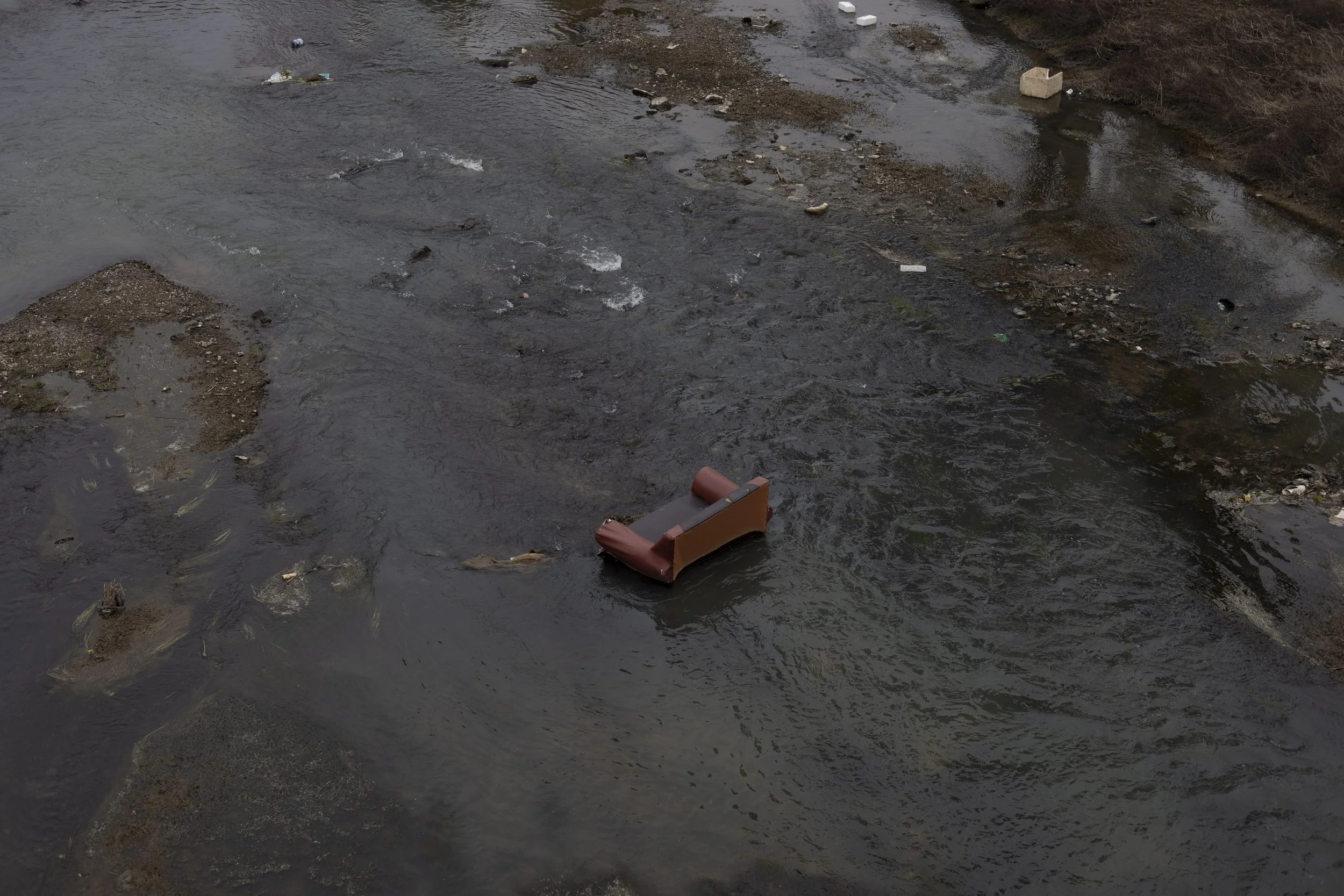 Andrew Zou, Sofa in the River, Archival Inkjet Print, 24 x 36, $1,800.jpeg