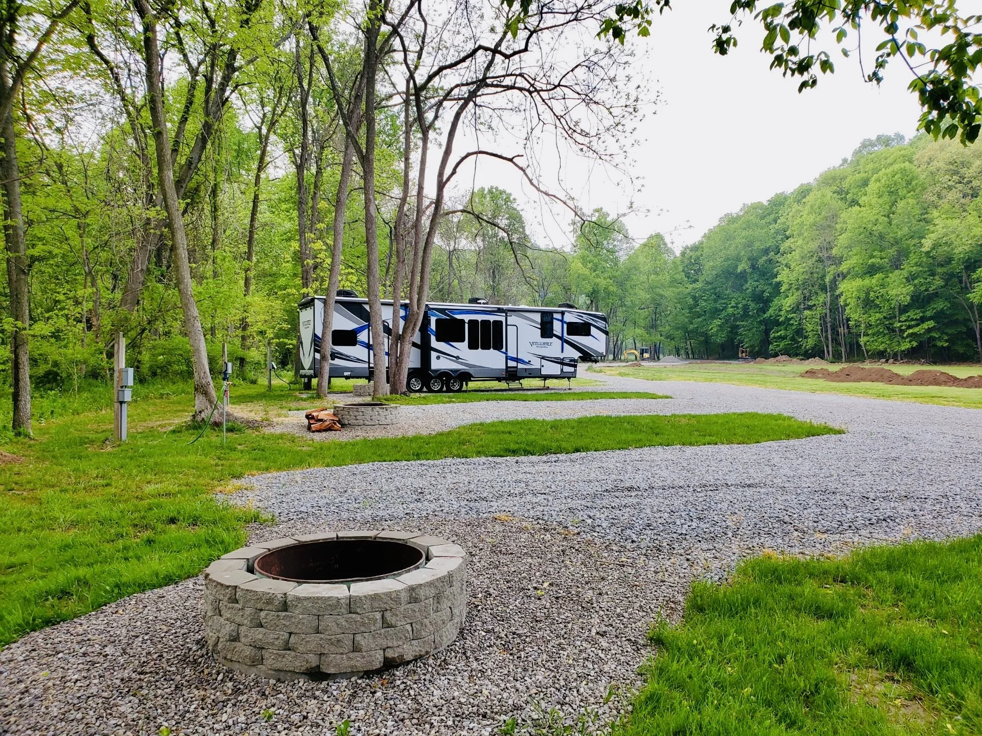 A quiet, peaceful and pet-friendly campground serving the Hocking Hills and Logan, Ohio areas with electric, water, dump station, trash disposal and Wi-Fi on-site. Fire pits and picnic tables are also available at each site.