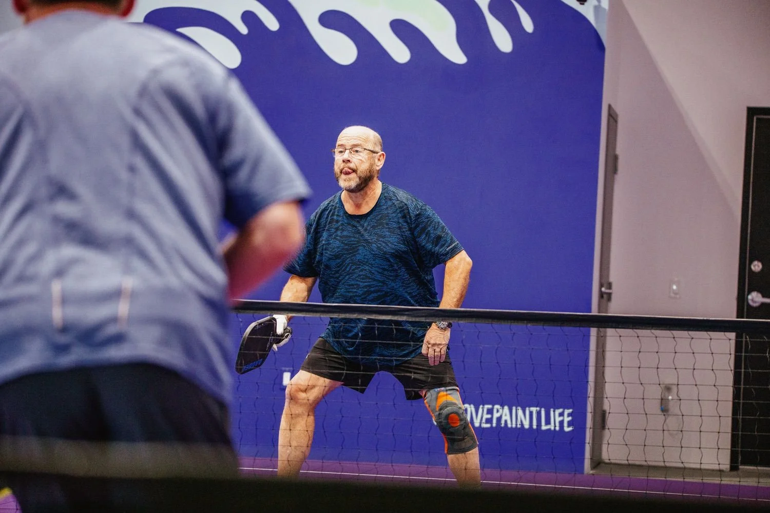 A man playing pickleball at pickleball cove near halifax nova scotia