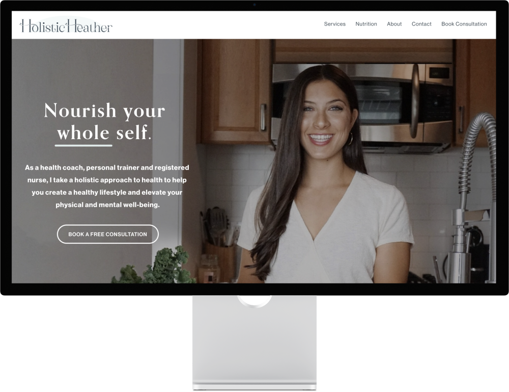 Homepage of Holistic Heather, a health coaching and personal training service, featuring a smiling woman with long dark hair in a kitchen setting.